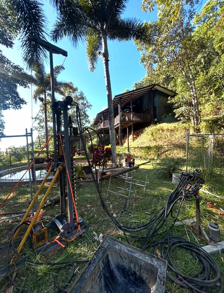 Rees Drilling compact rig working near trees