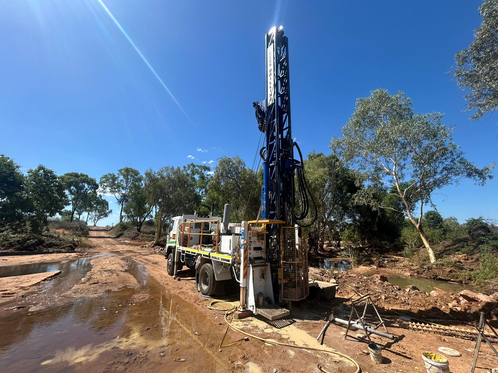 Rees Drilling compact rig working near trees