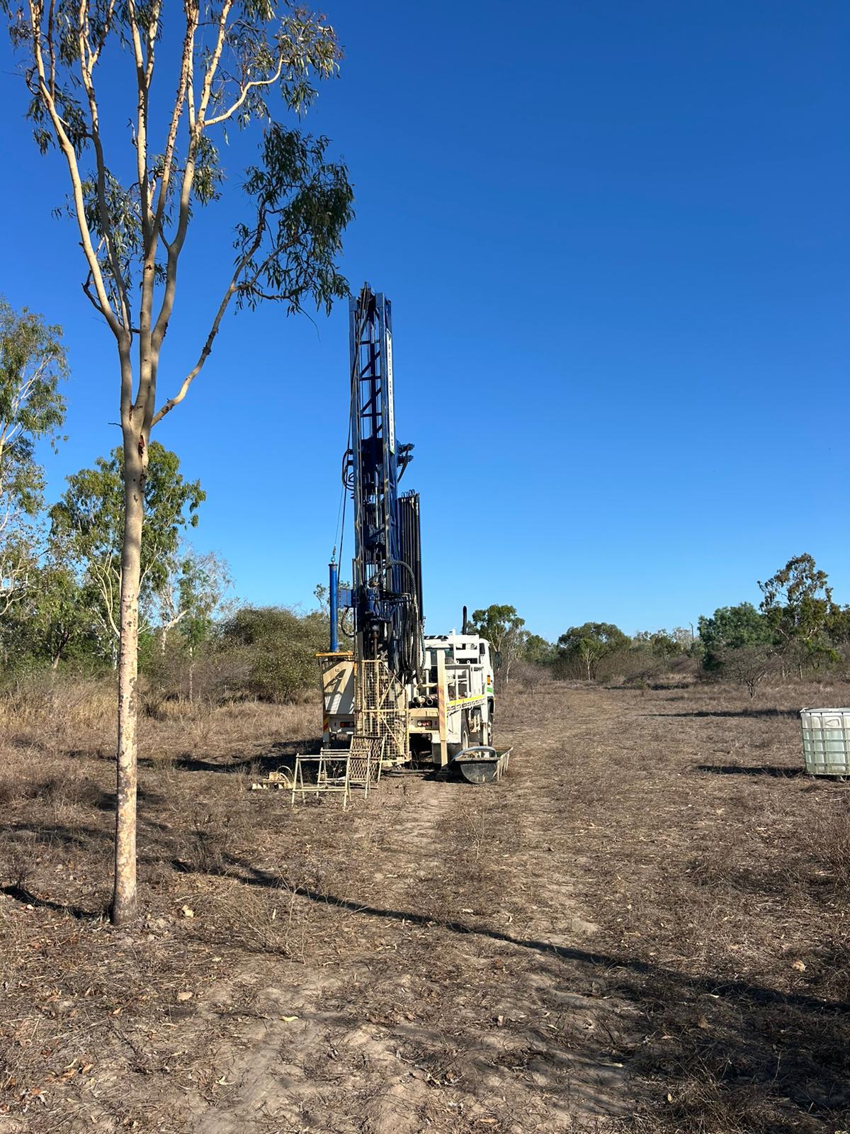 Rees Drilling compact rig working near trees