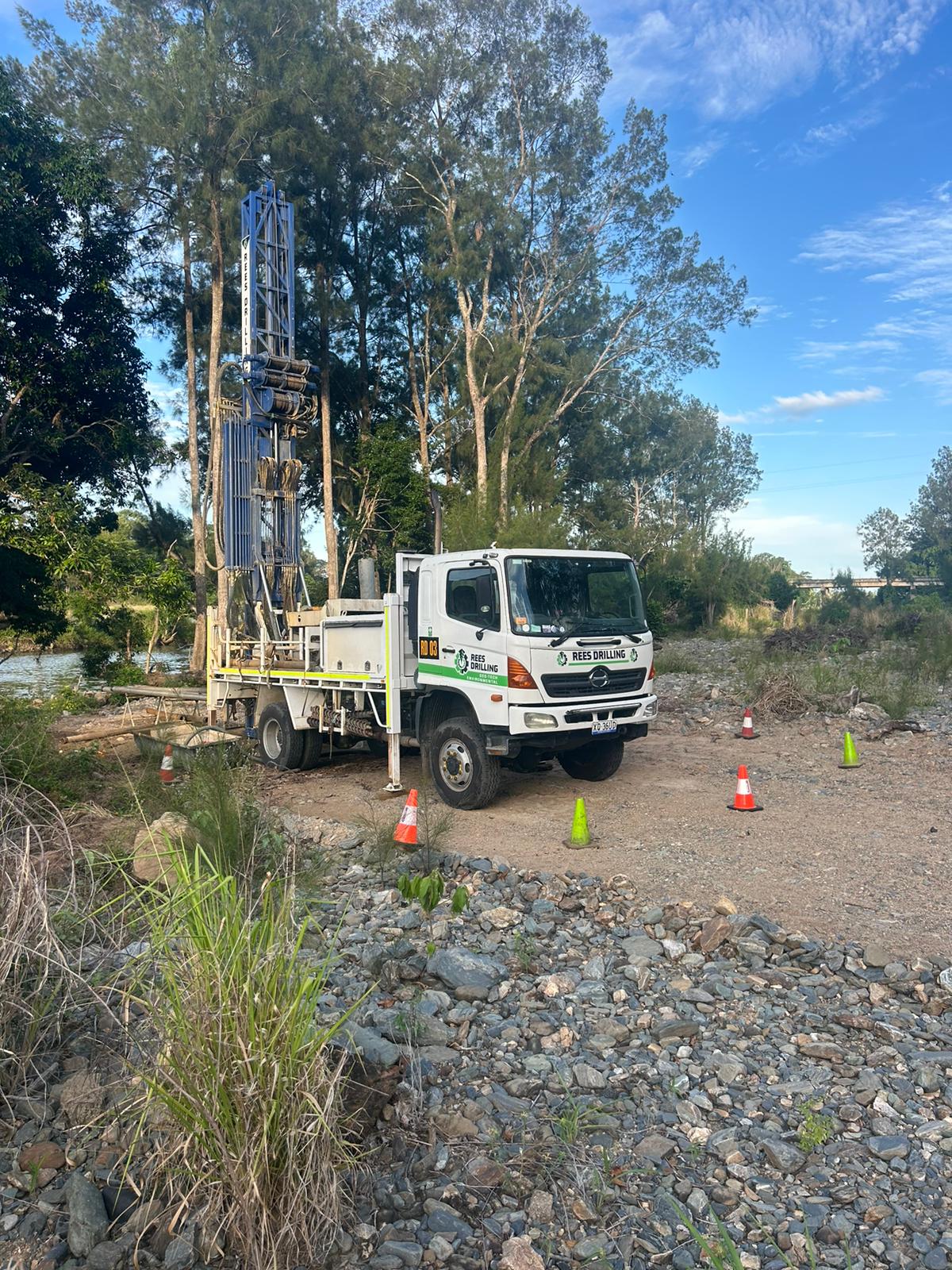 Rees Drilling compact rig working near trees
